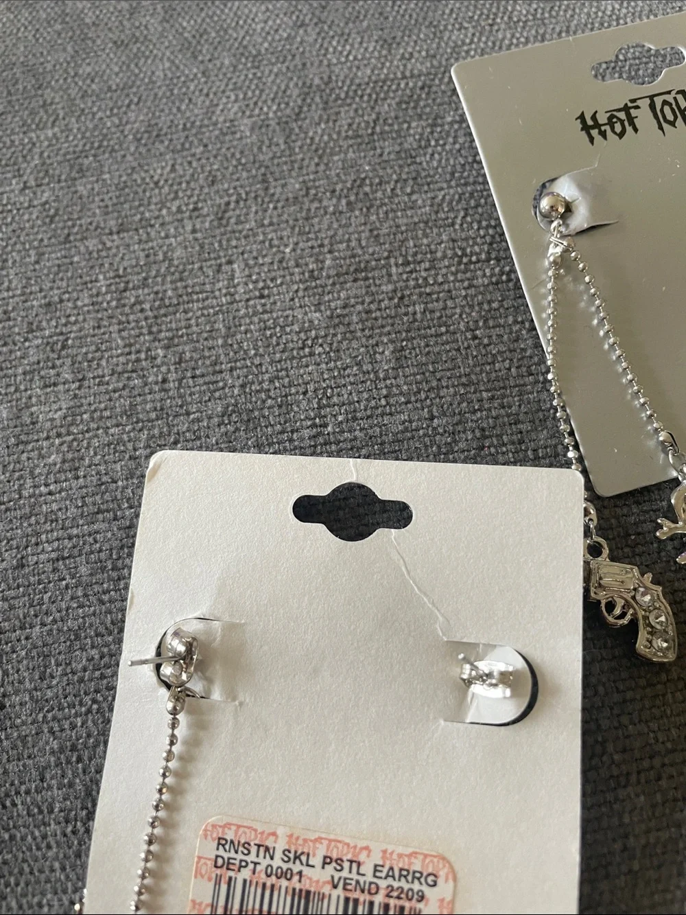 Hot Topic Silver Rhinestone Crossed Gun Pendant and Dangle Earring Set